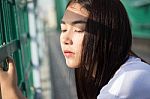 Thai Adult Girl White T-shirt Beautiful Girl Relax And Smile Stock Photo