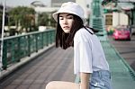 Thai Adult Girl White T-shirt Beautiful Girl Relax And Smile Stock Photo