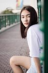 Thai Adult Girl White T-shirt Beautiful Girl Relax And Smile Stock Photo