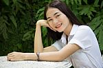 Thai Adult Student University Uniform Beautiful Girl Relax And Smile Stock Photo