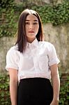 Thai Adult Student University Uniform Beautiful Girl Relax And Smile Stock Photo