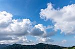 The Beauty Of The Sky When Light Hits The Clouds And Mountain Stock Photo