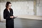 The Hand Of A Businesswoman Is Pressing A Calculator Counting  I Stock Photo