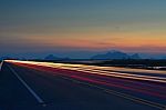 The Light Trails On The Street With Sunset Stock Photo