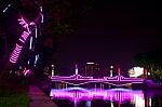  The Lights Of The Bridge And The River In The Middle Of The City Stock Photo