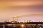 Thermal Power Plant And Cooling Towers At Night Stock Photo