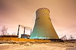 Thermal Power Plant And Cooling Towers At Night Stock Photo