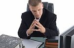 Thinking Businessman In Office Stock Photo
