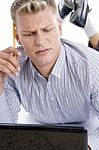 Thinking Man With Laptop And Pencil Stock Photo