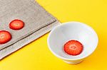 Three Fresh Slices Of Strawberry Stock Photo