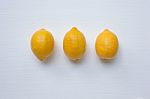 Three Yellow Lemons With On White Stock Photo