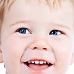 Toddler Blond And Blue Eyes Boy Child With Various Facial Expres Stock Photo