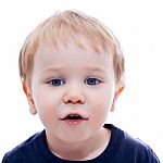 Toddler Blond And Blue Eyes Boy Child With Various Facial Expres Stock Photo