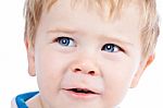 Toddler Blond And Blue Eyes Boy Child With Various Facial Expres Stock Photo