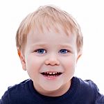 Toddler Blond And Blue Eyes Boy Child With Various Facial Expres Stock Photo