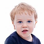 Toddler Blond And Blue Eyes Boy Child With Various Facial Expres Stock Photo