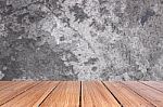 Top Of Wood Table On Old Concrete Wall Background Stock Photo