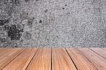 Top Of Wood Table On Old Concrete Wall Background Stock Photo