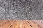 Top Of Wood Table On Old Concrete Wall Background Stock Photo