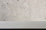 Top Of Wood Table On Old Concrete Wall Background Stock Photo