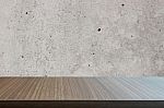 Top Of Wood Table On Old Concrete Wall Background Stock Photo