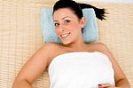 Top View Of Relaxing Female Against White Background Stock Photo