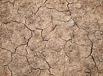 Top View Shot Of Cracked Soil Stock Photo