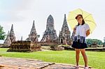 Tourist Girl At Wat Chaiwatthanaram Temple Stock Photo