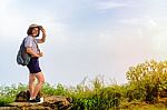 Tourist Teen Girl Poses On Mountain Stock Photo