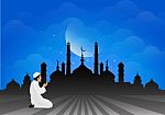 Traditional Clothes Muslim Man Making A Supplication (salah) While Standing On A Praying Rug Against The Backdrop Of The Mosque. Illustration Stock Photo