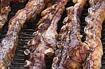 Traditional Meat Grilled On The Grill In The Argentine Countryside Stock Photo