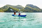 Travel By Boat With A Kayak Stock Photo