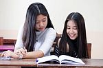 Two Asia Thai High School Student Uniform Best Friends Beautiful Girl Reading Book Stock Photo