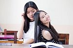 Two Asia Thai High School Student Uniform Best Friends Beautiful Girl Reading Book Stock Photo