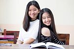 Two Asia Thai High School Student Uniform Best Friends Beautiful Girl Reading Book Stock Photo