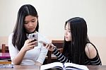 Two Asia Thai High School Student Uniform Best Friends Beautiful Girl Reading Book Stock Photo