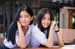 Two Asia Thai High School Student Uniform Best Friends Beautiful Girl Reading Book Stock Photo