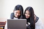 Two Asia Thai High School Student Uniform Best Friends Beautiful Girl Using Her Laptop Stock Photo