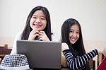 Two Asia Thai High School Student Uniform Best Friends Beautiful Girl Using Her Laptop Stock Photo