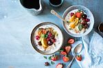 Two Bowls Of Fruit Porridge For Breakfast Stock Photo