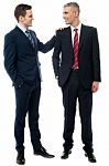 Two Business Partners Talking Together Stock Photo