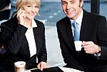 Two Business Professionals At Coffee Shop Stock Photo