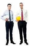 Two Businessmen With Hard Hats Stock Photo