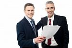 Two Managers Reading Some Documents Stock Photo