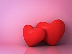 Two Red Hearts On Pink Stock Photo
