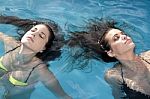 Two Women In The Pool Stock Photo