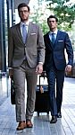 Two Young Executives Arriving At The Hotel Stock Photo