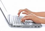 Typing On Laptop Stock Photo