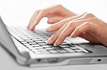 Typing On Laptop Stock Photo