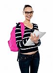 University Girl Posing With Backpack Stock Photo